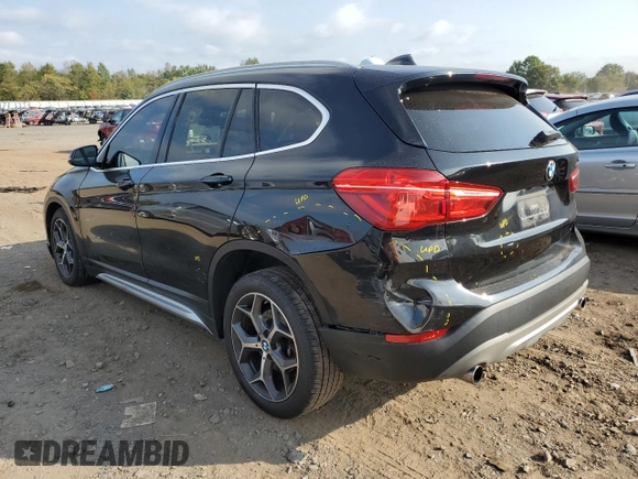 2018 BMW X1 xDrive28i with VIN WBXHT3C33J5F90612, listed as a Copart auction lot 74937654 with 72,561 mi miles and Salvage Title. Bid and sale history available at carsss.com. Image 2.