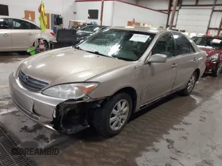 2003 Toyota Camry LE with VIN 4T1BE32K73U136399, listed as a IAAI auction lot 41877554 with 235,078 mi miles and . Bid and sale history available at DreamBid. Image 2.