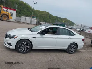2020 Volkswagen Jetta SEL z VIN 3VWEB7BU3LM073029, wystawiony jako IAAI lot #42168239 z przebiegiem 59 395 mil mil oraz . Historia ofert i sprzedaży dostępna na DreamBid. Obrazek 14.