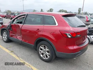 2015 Mazda CX-9 Touring with VIN JM3TB2CV5F0458675, listed as a IAAI auction lot 42047786 with 120,890 mi miles and . Bid and sale history available at carsss.com. Image 3.
