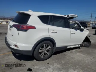 2018 Toyota RAV4 XLE with VIN JTMWFREV2JJ745183, listed as a Copart auction lot 63838185 with Not provided miles and Salvage title. Bid and sale history available at DreamBid. Image 3.