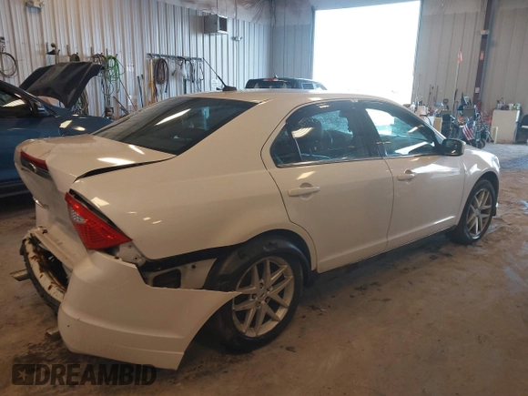 2012 Ford Fusion SEL with VIN 3FAHP0JGXCR128976, listed as a IAAI auction lot 41721468 with 115,277 mi miles. Bid and sale history available at carsss.com. Image 4.