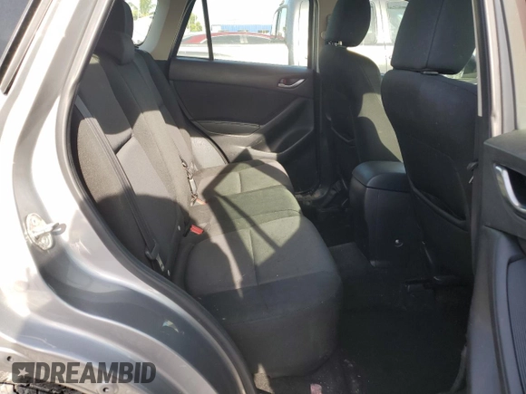 2015 Mazda CX-5 Sport with VIN JM3KE2BE2F0445810, listed as a Copart auction lot 65672555 with 218,675 mi miles and Clean title. Bid and sale history available at DreamBid. Image 10.