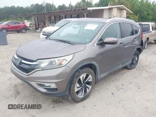 2015 Honda CR-V Touring z VIN 5J6RM3H99FL002315, wystawiony jako IAAI lot #42364421 z przebiegiem 94 018 mil mil oraz . Historia ofert i sprzedaży dostępna na DreamBid. Obrazek 2.