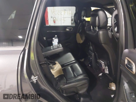 2016 Jeep Grand Cherokee Limited 75th Anniversary with VIN 1C4RJFBG3GC311089, listed as a IAAI auction lot 41953517 with 127,720 mi miles and . Bid and sale history available at DreamBid. Image 8.