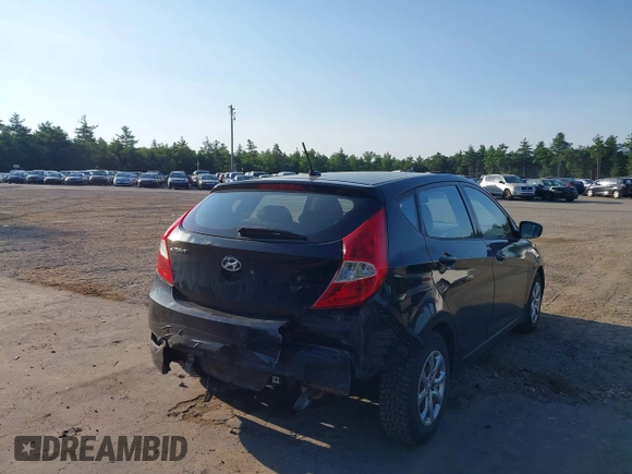 2013 Hyundai Accent GS with VIN KMHCT5AE7DU083576, listed as a IAAI auction lot 42693108 with 100,741 mi miles and . Bid and sale history available at DreamBid. Image 4.