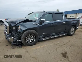2019 GMC Sierra 1500 SLT z VIN 3GTU9DEDXKG150576, wystawiony jako Copart lot #57410015 z przebiegiem 81 303 mil mil oraz Czysty tytuł • Clean title. Historia ofert i sprzedaży dostępna na DreamBid. Obrazek 1.