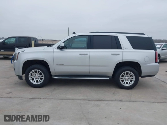 2015 GMC Yukon SLT with VIN 1GKS1BKC3FR253184, listed as a IAAI auction lot 41574610 with 152,543 mi miles. Bid and sale history available at carsss.com. Image 14.
