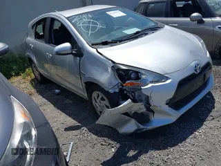 2016 Toyota Prius One z VIN JTDKDTB35G1133623, wystawiony jako IAAI lot #42269227 z przebiegiem 56 434 mil mil oraz . Historia ofert i sprzedaży dostępna na DreamBid. Obrazek 1.