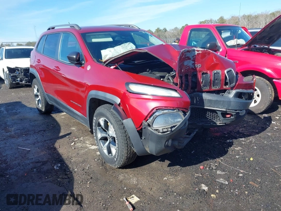 2014 Jeep Cherokee Trailhawk with VIN 1C4PJMBS0EW257133, listed as a IAAI auction lot 41446095 with 82,285 mi miles and . Bid and sale history available at DreamBid. Image 1.