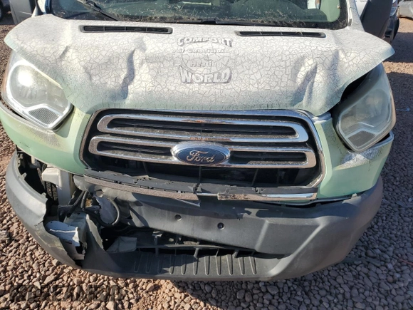 2016 Ford Transit Cargo with VIN 1FTYR1ZMXGKA59298, listed as a Copart auction lot 49418815 with 116,982 mi miles and Salvage Title. Bid and sale history available at carsss.com. Image 12.