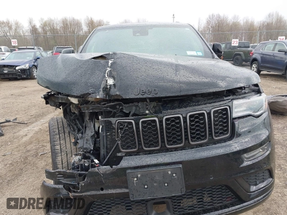 2021 Jeep Grand Cherokee 80th Anniversary with VIN 1C4RJFBG7MC828116, listed as a IAAI auction lot 42118355 with 57,240 mi miles and . Bid and sale history available at DreamBid. Image 13.