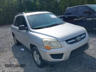 2009 Kia Sportage LX with VIN KNDJF724097567972, listed as a IAAI auction lot 42101204 with 221,299 mi miles. Bid and sale history available at carsss.com. Image 1.