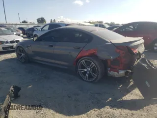 2015 BMW M6 z VIN WBS6C9C52FD467461, wystawiony jako Copart lot #68057084 z przebiegiem 130 687 mil mil oraz Szkoda całkowita • Salvage title. Historia ofert i sprzedaży dostępna na DreamBid. Obrazek 2.