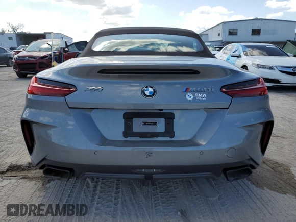 2024 BMW Z4 sDriveM40i with VIN WBAHF9C02RWY35106, listed as a Copart auction lot 76471014 with Not provided miles and Salvage title. Bid and sale history available at DreamBid. Image 6.