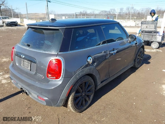 2015 MINI Cooper Hardtop S with VIN WMWXP7C54F2A37754, listed as a IAAI auction lot 41153690 with 99,528 mi miles. Bid and sale history available at carsss.com. Image 4.