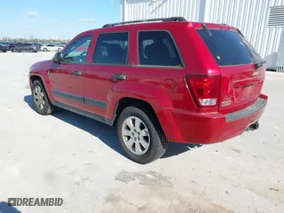 2006 Jeep Grand Cherokee Laredo with VIN 1J4HR48N56C112794, listed as a IAAI auction lot 42008002 with 207,065 mi miles. Bid and sale history available at carsss.com. Image 3.