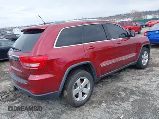 2012 Jeep Grand Cherokee Laredo with VIN 1C4RJFAG7CC221682, listed as a IAAI auction lot 41881922 with 218,762 mi miles. Bid and sale history available at carsss.com. Image 4.