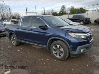 2017 Honda Ridgeline RTL with VIN 5FPYK3F57HB011597, listed as a Copart auction lot 49307885 with 140,157 mi miles and Salvage title. Bid and sale history available at DreamBid. Image 4.