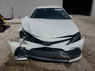 2023 Toyota Camry LE z VIN 4T1C11AK1PU770237, wystawiony jako Copart lot #55590655 z przebiegiem 50 980 mil mil oraz Szkoda całkowita • Salvage title. Historia ofert i sprzedaży dostępna na DreamBid. Obrazek 5.