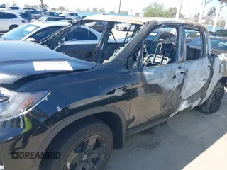 2024 Honda Ridgeline Black Edition with VIN 5FPYK3F89RB015601, listed as a IAAI auction lot 41880308 with Not provided miles and . Bid and sale history available at DreamBid. Image 6.