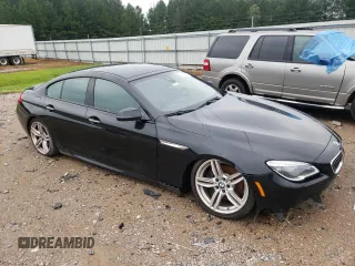 2017 BMW 6 Series 640i xDrive with VIN WBA6D2C58HGT66290, listed as a Copart auction lot 65738404 with 105,783 mi miles and Salvage Title. Bid and sale history available at carsss.com. Image 4.