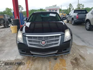 2009 Cadillac CTS RWD w/1SB with VIN 1G6DU57V290147277, listed as a IAAI auction lot 41995209 with 120,576 mi miles. Bid and sale history available at carsss.com. Image 6.