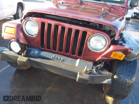 2003 Jeep Wrangler Sport with VIN 1J4FA49S33P345192, listed as a IAAI auction lot 41801344 with 196,472 mi miles. Bid and sale history available at carsss.com. Image 6.
