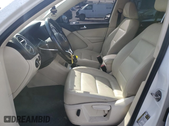 2012 Volkswagen Tiguan S with VIN WVGBV7AX3CW575463, listed as a Copart auction lot 77889064 with 168,520 mi miles and Salvage Title. Bid and sale history available at DreamBid. Image 7.