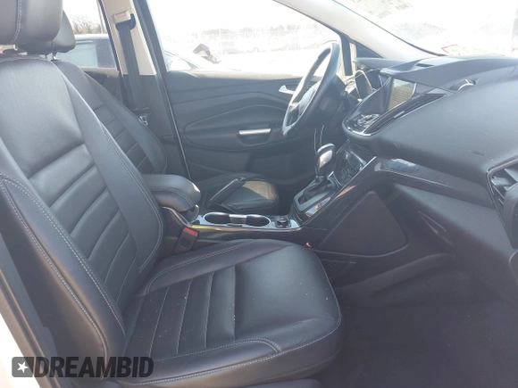 2016 Ford Escape Titanium with VIN 1FMCU9J96GUB65441, listed as a IAAI auction lot 41412223 with 74,218 mi miles. Bid and sale history available at carsss.com. Image 5.