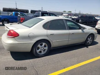 2006 Ford Taurus SE с VIN 1FAFP53U96A169458, выставлен на аукционе Copart как лот 59400185 с пробегом 103 020 миль миль и Списание • Salvage title. История ставок и продаж доступна на DreamBid. Изображение 3.
