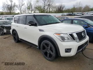 2017 Nissan Armada Platinum with VIN JN8AY2NE9H9700219, listed as a Copart auction lot 48886434 with 129,467 mi miles and Salvage Title. Bid and sale history available at carsss.com. Image 4.