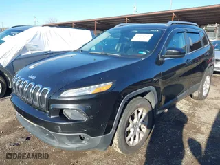 2014 Jeep Cherokee Latitude with VIN 1C4PJMCS2EW124467, listed as a IAAI auction lot 41944747 with 132,890 mi miles. Bid and sale history available at carsss.com. Image 17.