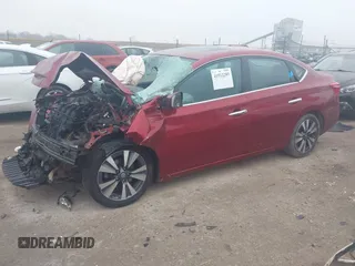 2019 Nissan Sentra S z VIN 3N1AB7AP7KY256134, wystawiony jako IAAI lot #41512289 z przebiegiem Nie podano mil oraz . Historia ofert i sprzedaży dostępna na DreamBid. Obrazek 18.