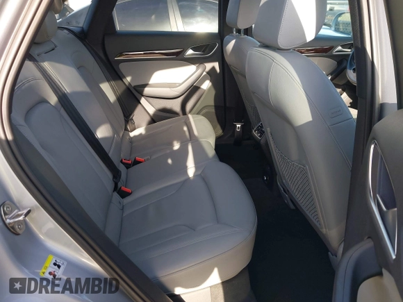 2017 Audi Q3 Premium Plus z VIN WA1JCCFSXHR000319, wystawiony jako IAAI lot #41986889 z przebiegiem 74 675 mil mil oraz . Historia ofert i sprzedaży dostępna na DreamBid. Obrazek 8.