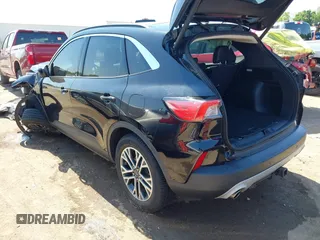 2020 Ford Escape SEL z VIN 1FMCU9H91LUB86584, wystawiony jako IAAI lot #42268456 z przebiegiem 94 753 mil mil oraz . Historia ofert i sprzedaży dostępna na DreamBid. Obrazek 3.