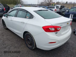2017 Chevrolet Cruze LT with VIN 1G1BE5SM0H7100327, listed as a IAAI auction lot 42012403 with 122,493 mi miles and . Bid and sale history available at DreamBid. Image 3.