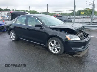 2014 Volkswagen Passat SE z VIN 1VWBT7A31EC105912, wystawiony jako IAAI lot #42124221 z przebiegiem 76 819 mil mil oraz . Historia ofert i sprzedaży dostępna na DreamBid. Obrazek 1.