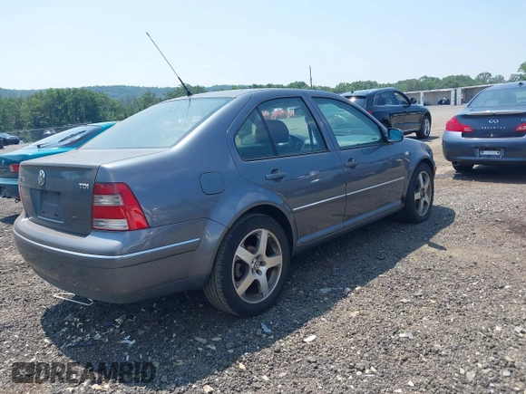 2004 Volkswagen Jetta GL with VIN 3VWRR69M04M128597, listed as a IAAI auction lot 42657556 with 283,728 mi miles and . Bid and sale history available at DreamBid. Image 4.