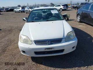 2000 Honda Civic LX with VIN 2HGEJ6673YH502410, listed as a IAAI auction lot 41992745 with 173,958 mi miles. Bid and sale history available at carsss.com. Image 12.