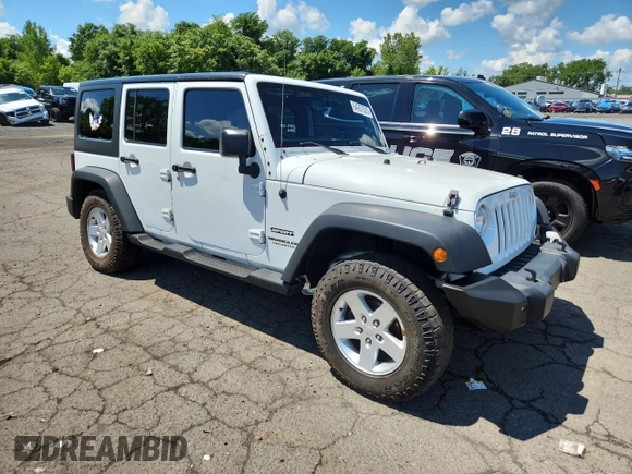 2015 Jeep Wrangler Unlimited Freedom with VIN 1C4HJWDGXFL755528, listed as a Copart auction lot 64927525 with 111,096 mi miles and Salvage title. Bid and sale history available at DreamBid. Image 4.