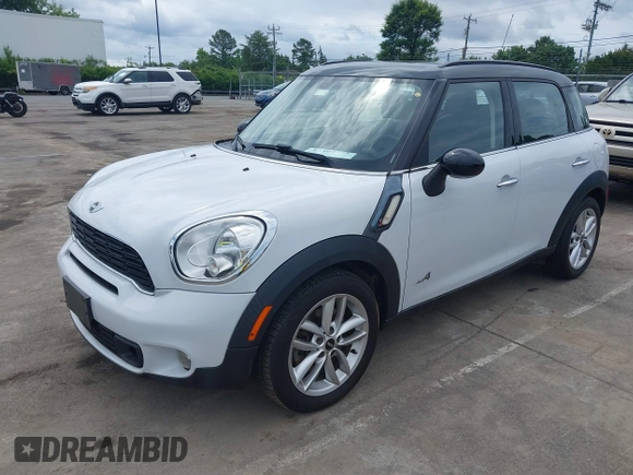 2014 MINI Countryman S z VIN WMWZC5C57EWP38396, wystawiony jako IAAI lot #42400771 z przebiegiem 147 302 mil mil oraz . Historia ofert i sprzedaży dostępna na DreamBid. Obrazek 2.