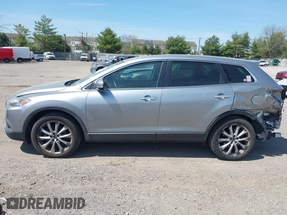 2014 Mazda CX-9 Grand Touring z VIN JM3TB3DV4E0429428, wystawiony jako IAAI lot #42094028 z przebiegiem 147 294 mil mil oraz . Historia ofert i sprzedaży dostępna na DreamBid. Obrazek 14.