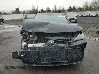 2019 Toyota Avalon Limited Hybrid z VIN 4T1B21FB2KU005290, wystawiony jako Copart lot #87433804 z przebiegiem 92 909 mil mil oraz Szkoda całkowita • Salvage title. Historia ofert i sprzedaży dostępna na DreamBid. Obrazek 5.