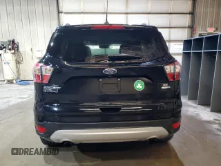 2018 Ford Escape SE z VIN 1FMCU9GD7JUD46213, wystawiony jako Copart lot #45981125 z przebiegiem 95 242 mil mil oraz Czysty tytuł • Clean title. Historia ofert i sprzedaży dostępna na DreamBid. Obrazek 6.
