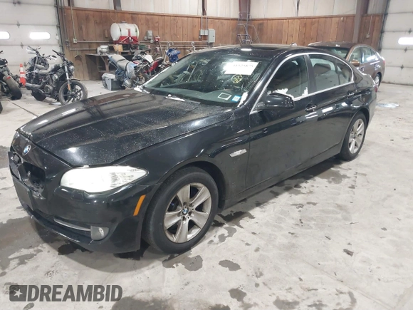 2013 BMW 5 Series 528i xDrive with VIN WBAXH5C57DD109045, listed as a IAAI auction lot 41525875 with 121,549 mi miles. Bid and sale history available at carsss.com. Image 2.
