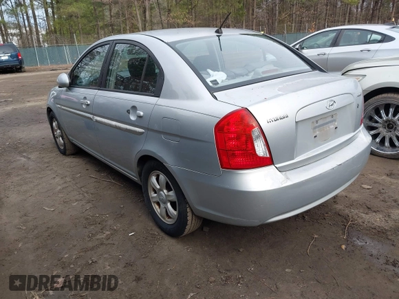 2006 Hyundai Accent GLS with VIN KMHCN46C46U012561, listed as a IAAI auction lot 41750609 with 286,770 mi miles. Bid and sale history available at carsss.com. Image 3.