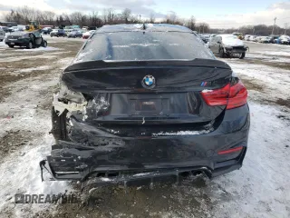 2018 BMW M4 with VIN WBS4Y9C51JAA92457, listed as a Copart auction lot 87014004 with 83,423 mi miles and Salvage Title. Bid and sale history available at carsss.com. Image 6.