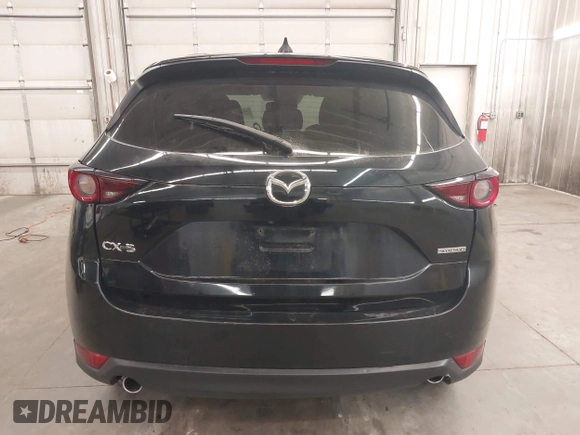 2020 Mazda CX-5 Touring with VIN JM3KFBCM9L1785125, listed as a IAAI auction lot 41983561 with 101,062 mi miles and . Bid and sale history available at carsss.com. Image 17.