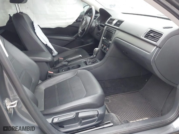 2015 Volkswagen Passat 1.8T Limited Edition with VIN 1VWAT7A34FC089282, listed as a IAAI auction lot 41767239 with 68,156 mi miles. Bid and sale history available at carsss.com. Image 5.